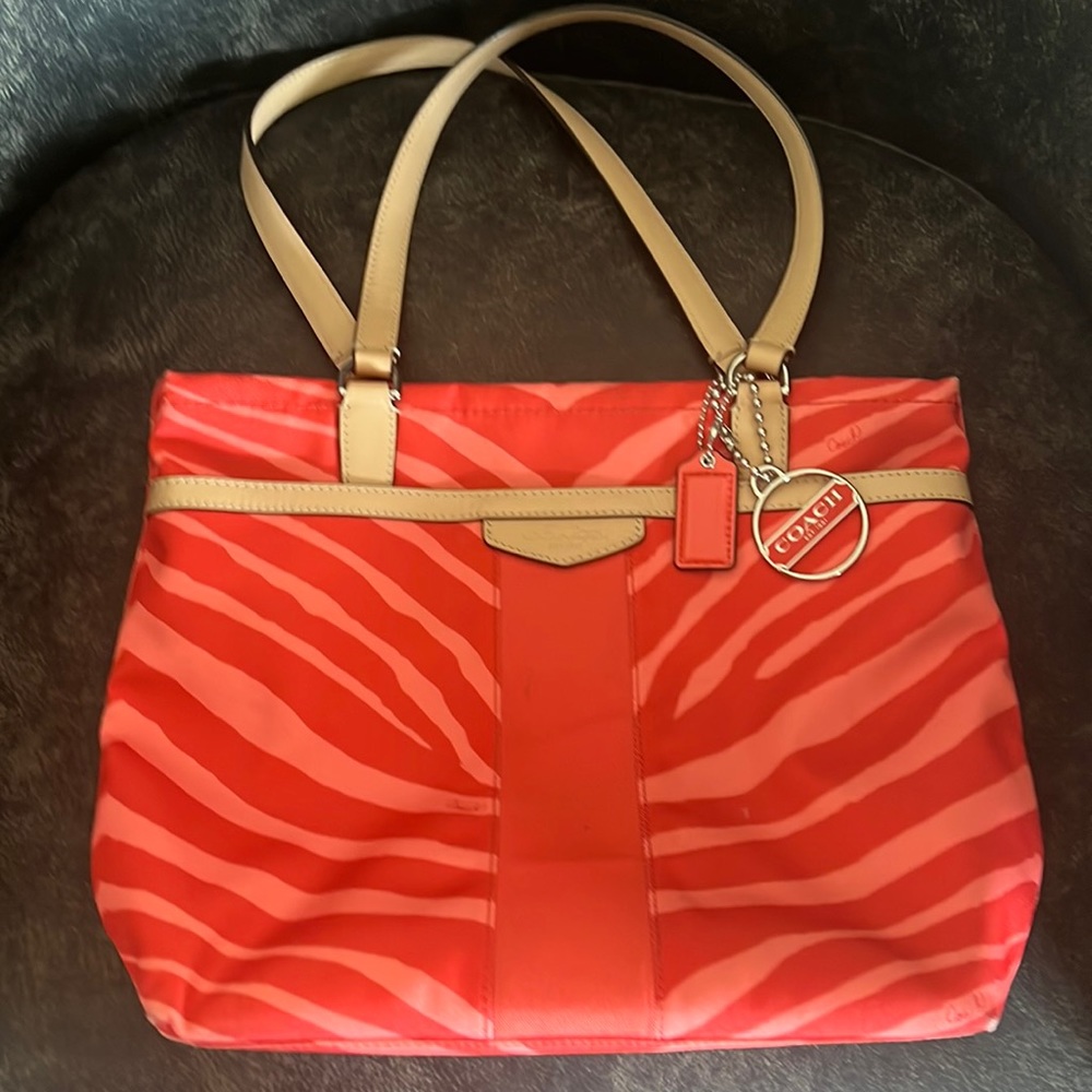 Coach fabric bag with a fun coral print.